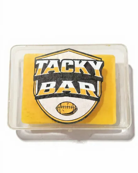 A Tacky Bar inside its clear carrying case