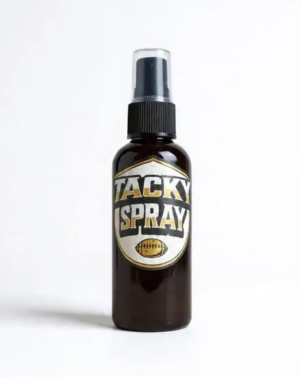 A bottle of Tacky Spray with a black pump top